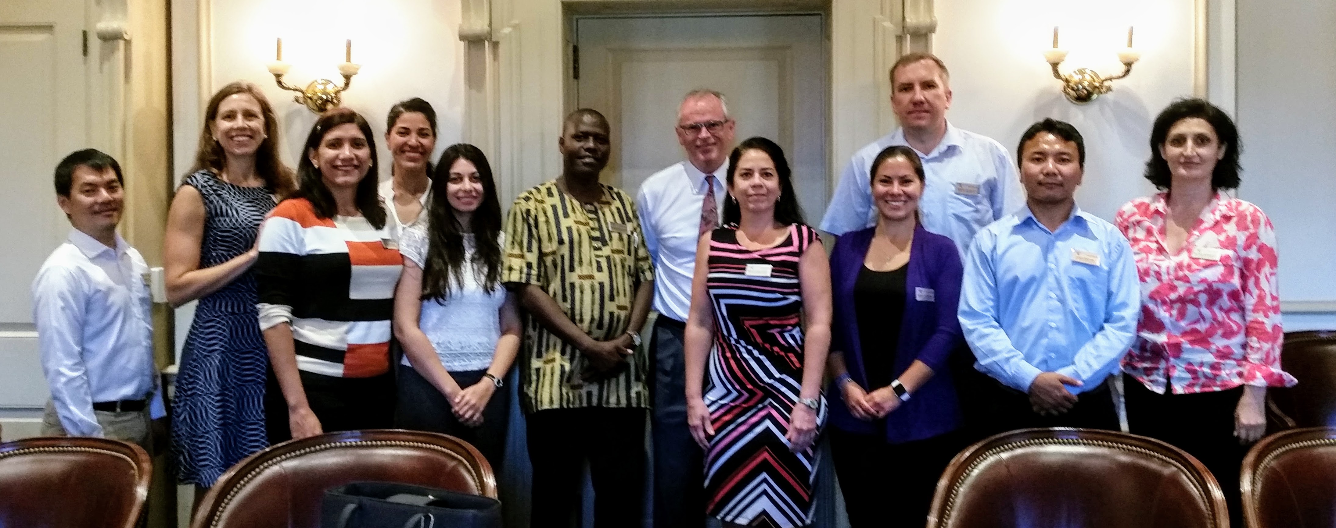 Fellows standing with Provost Nick Jones