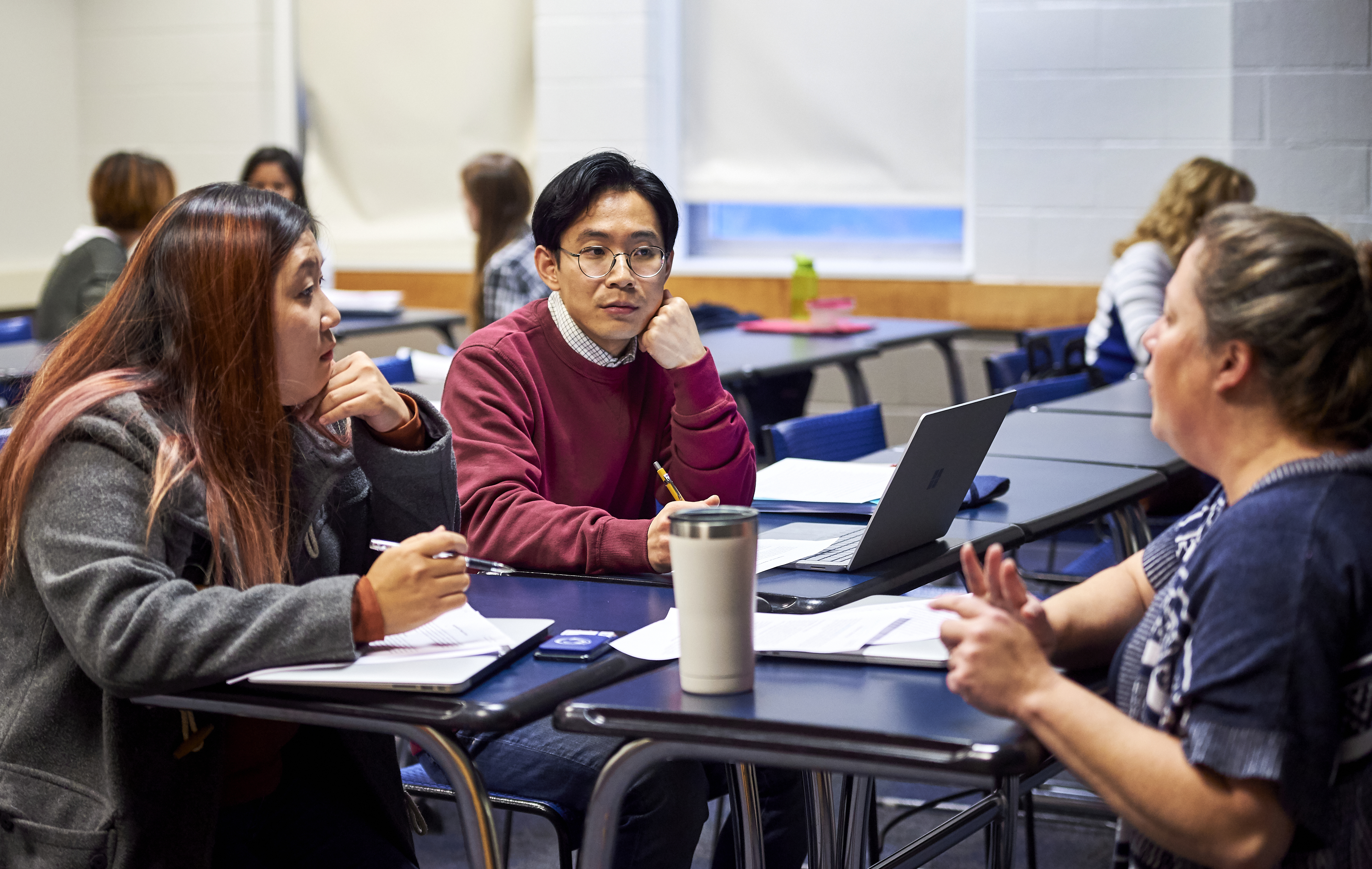 students engaging in conversation