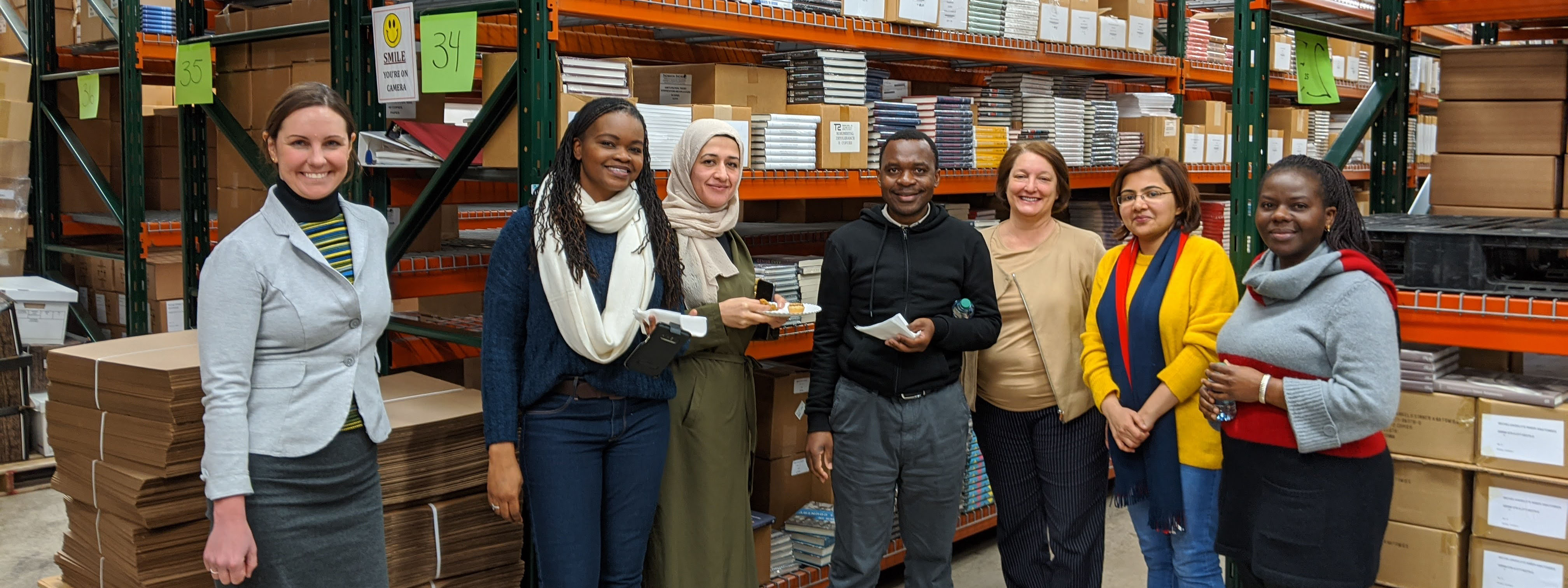 Fellows touring Penn State University Press warehouse.